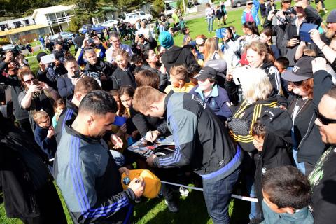 All Blacks signing autographs