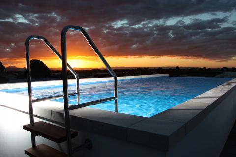 Rooftop pool at sunset