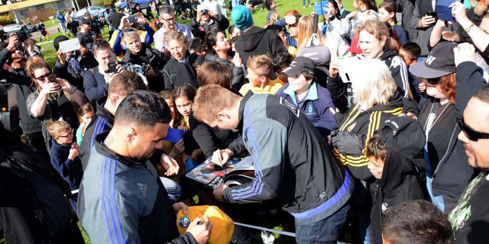 All Blacks signing autographs