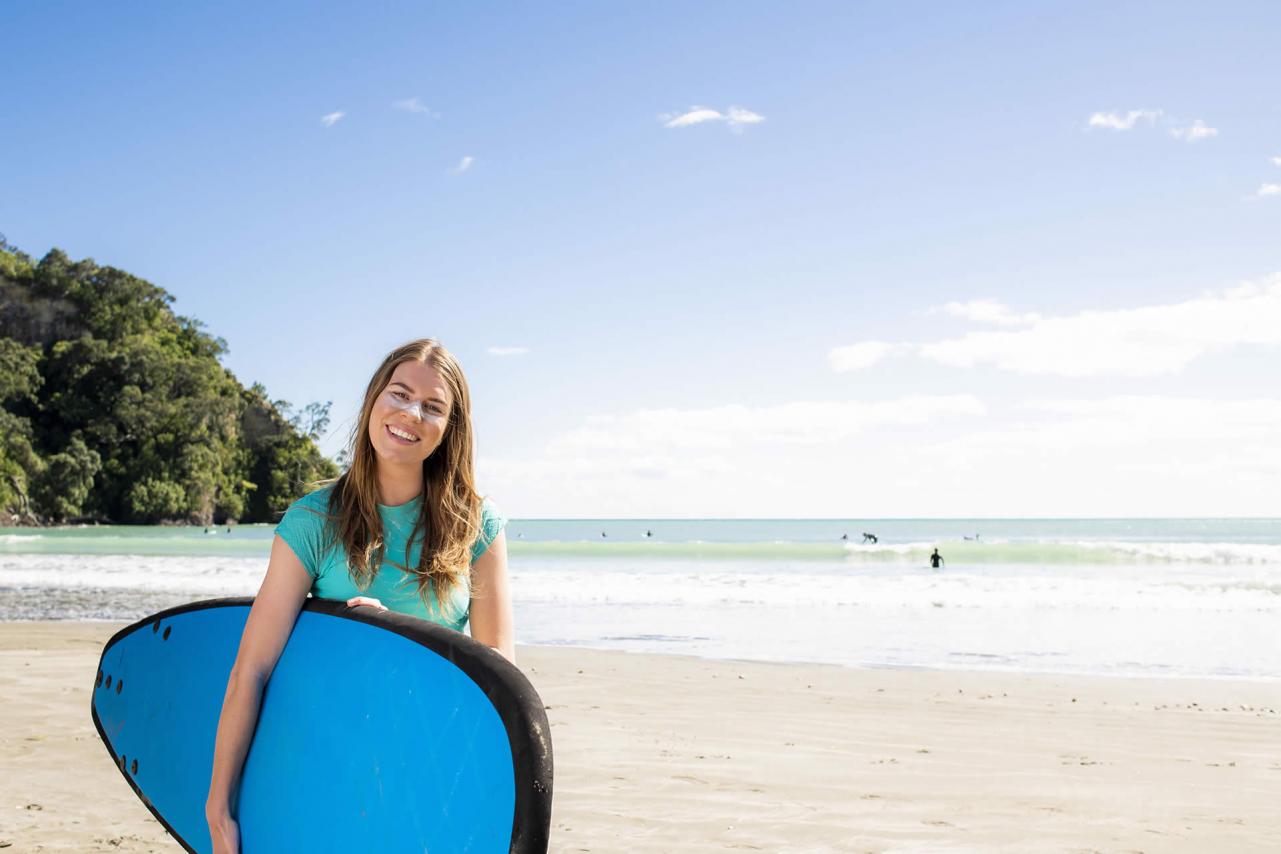 Surfer at Ohope Beach