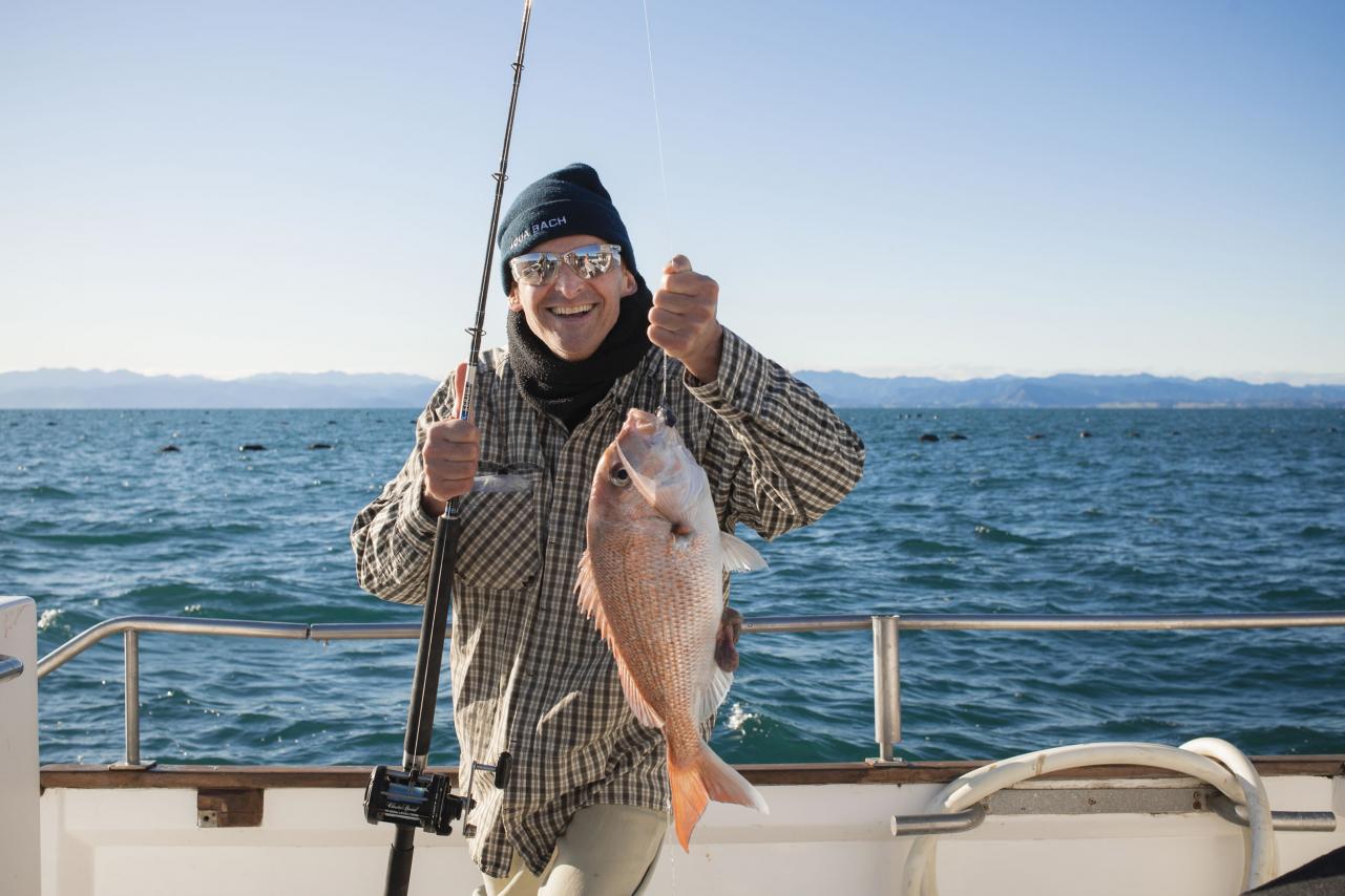 Fisherman with his catch