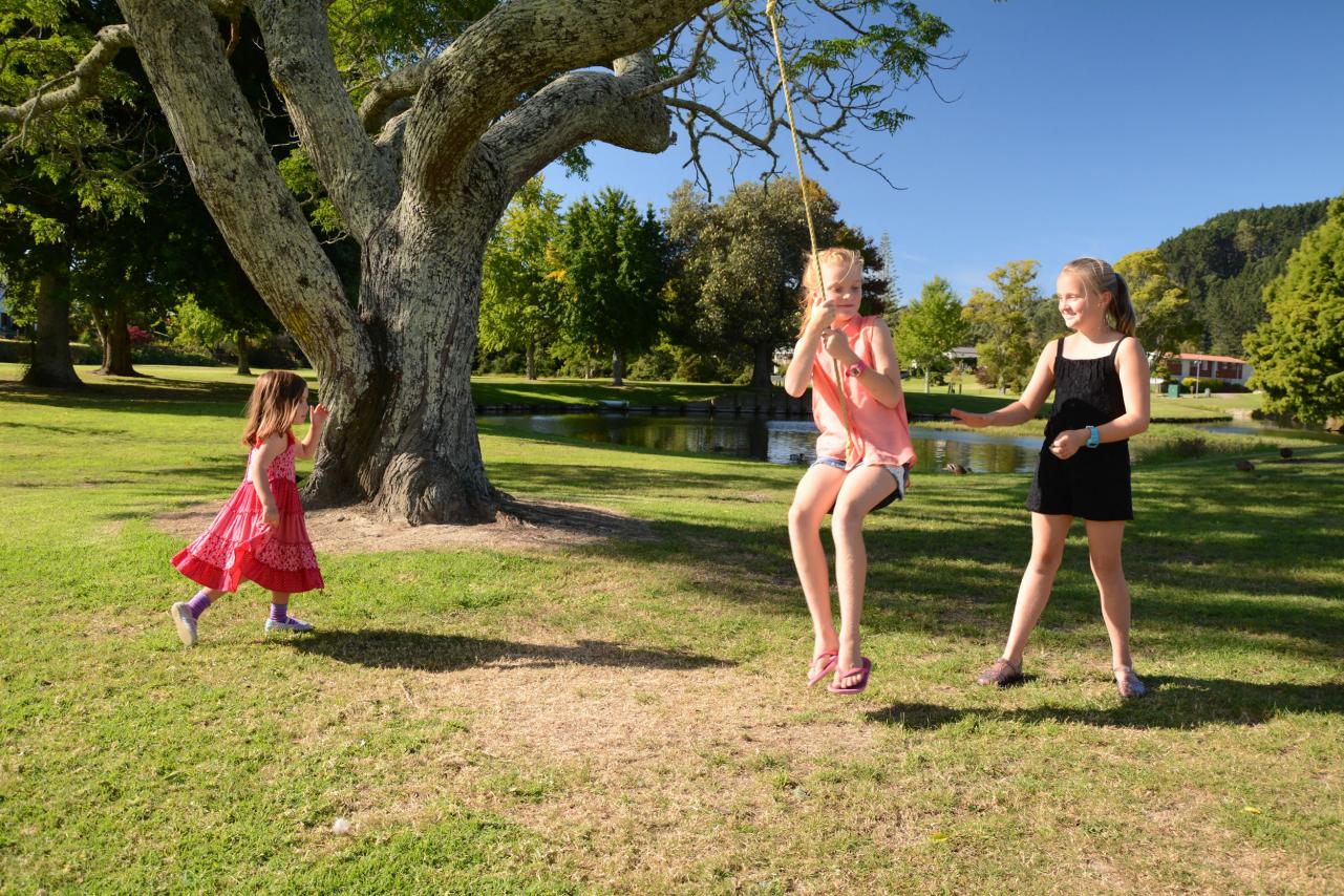 Kids playing on a swing