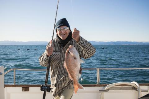 Fisherman with his catch