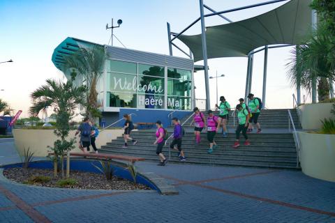 Trailwalker teams in front of i-SITE