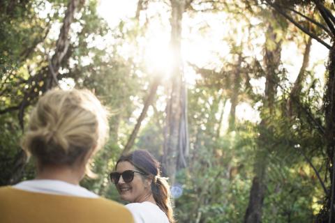 Friends walking through bush