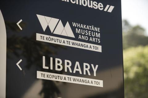 Sign to the library