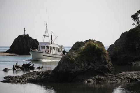 Boat crossing the bar