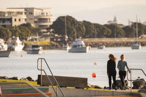 Walkers along the river